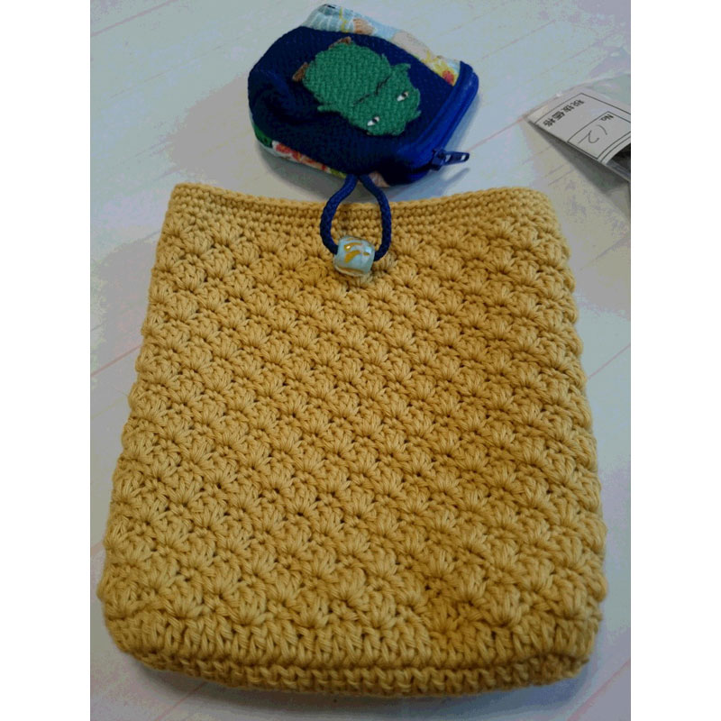 ゆみたろうさんの「レトロなポーチ」